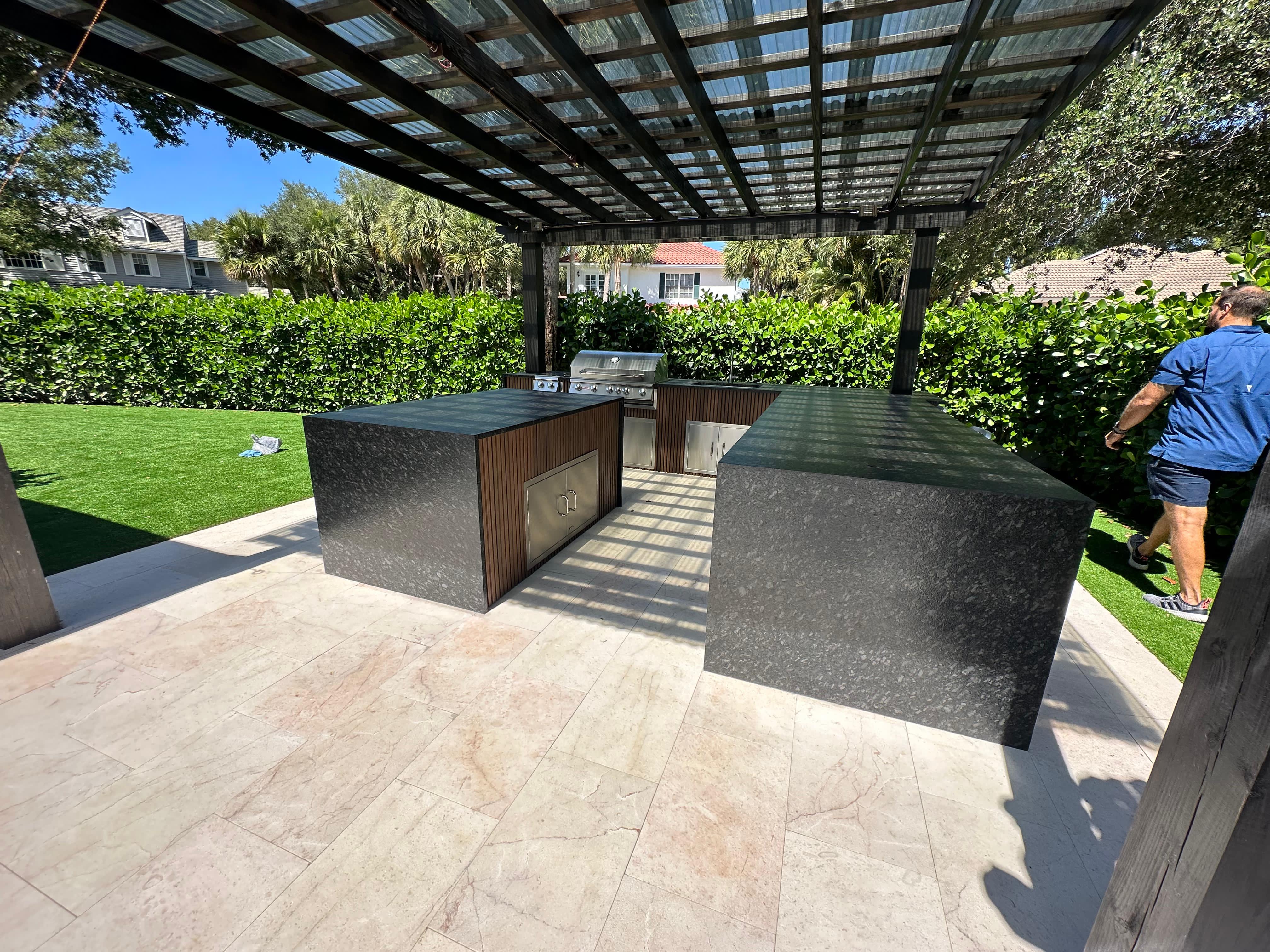 Pergola providing shade for outdoor kitchen